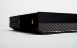 <p>The console's other side, where the 50-50 split is repeated. <p>The console's other side, where the 50-50 split is repeated.