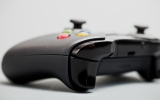 <p>New "impulse triggers" feature haptic feedback, and the shoulder buttons are nearly continuous for easier transition from trigger to bumper. <p>New "impulse triggers" feature haptic feedback, and the shoulder buttons are nearly continuous for easier transition from trigger to bumper.